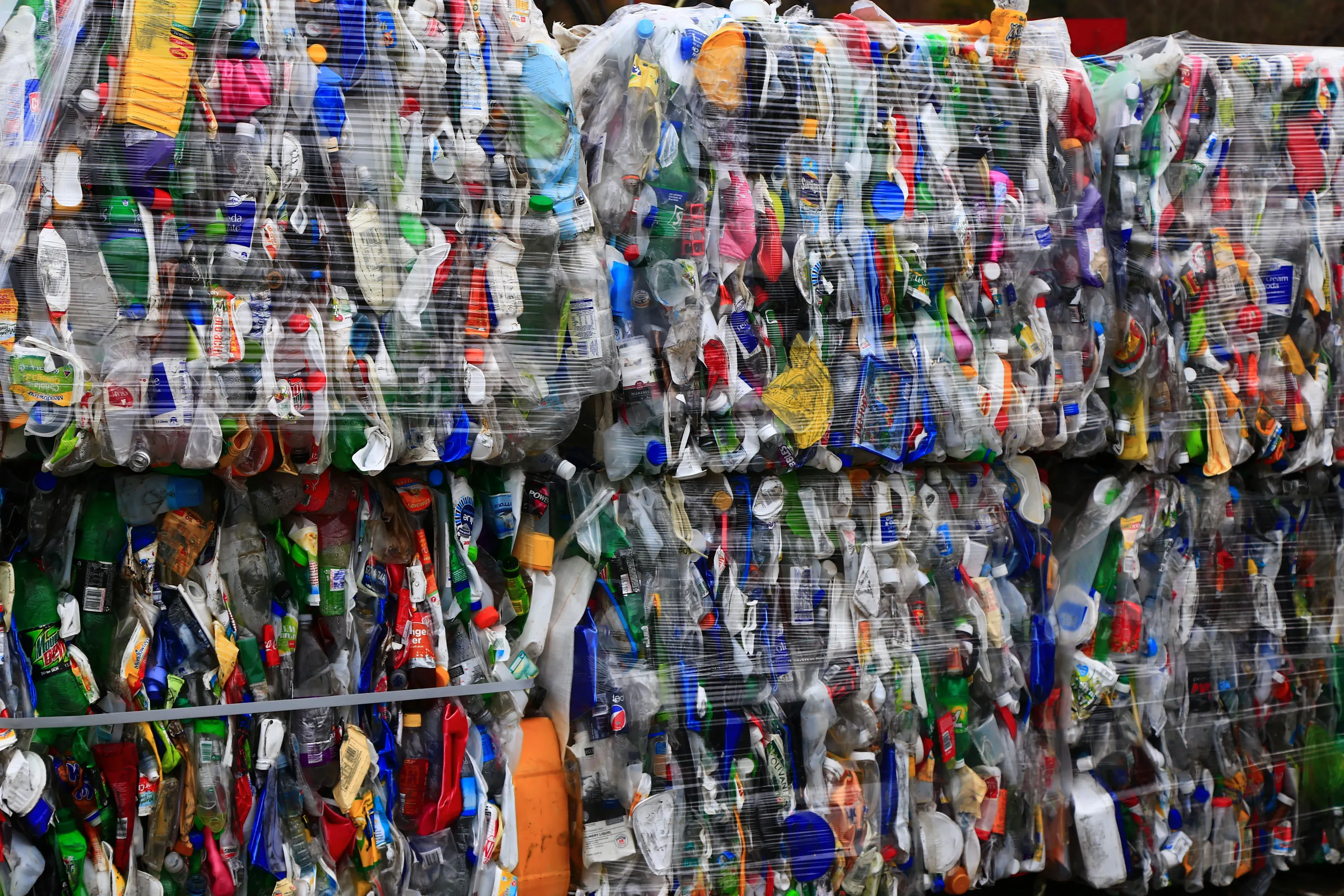 Bales of compressed plastic bottles and containers