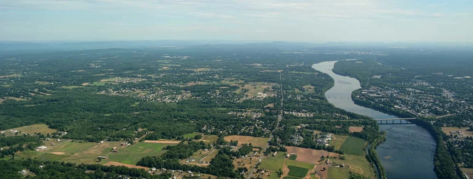 Aerial view of southeastern Connecticut with a river winding past farmland and towns